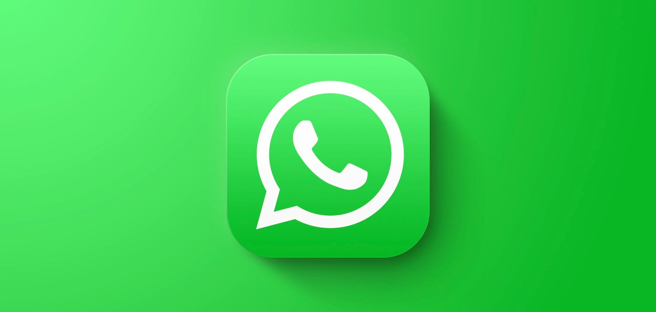 The WhatsApp icon with a drop shadow on a green background.